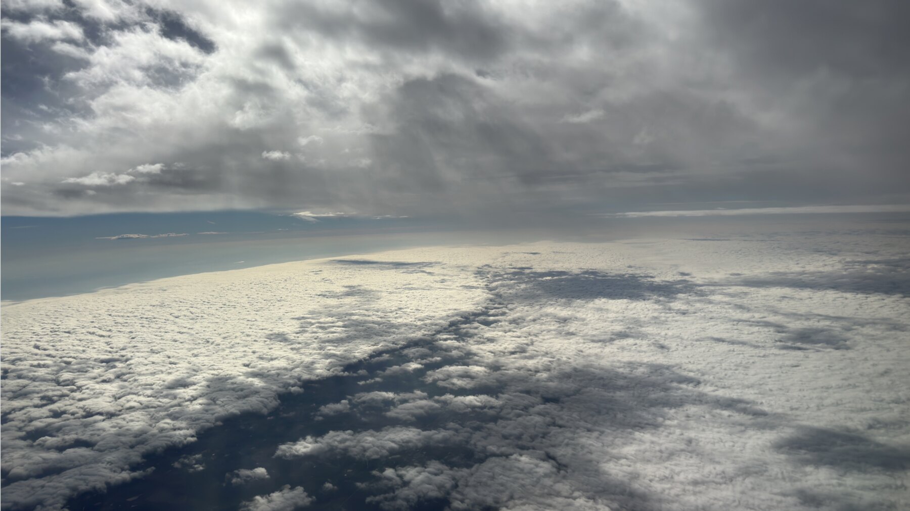 Sunlit cloud cover seen from above